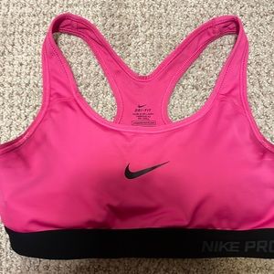 Nike Dri Fit Sports Bra with removable pads.  Hot pink, size small